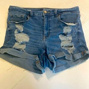 Aeropostale high rise midi size 10 mid-wash ripped Jean shorts.